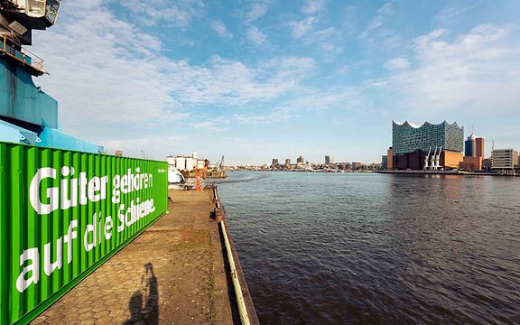 Elbphilharmonie and green DB Cargo container.