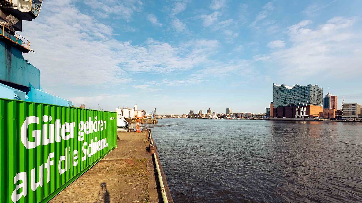 Elbphilharmonie and green DB Cargo container.
