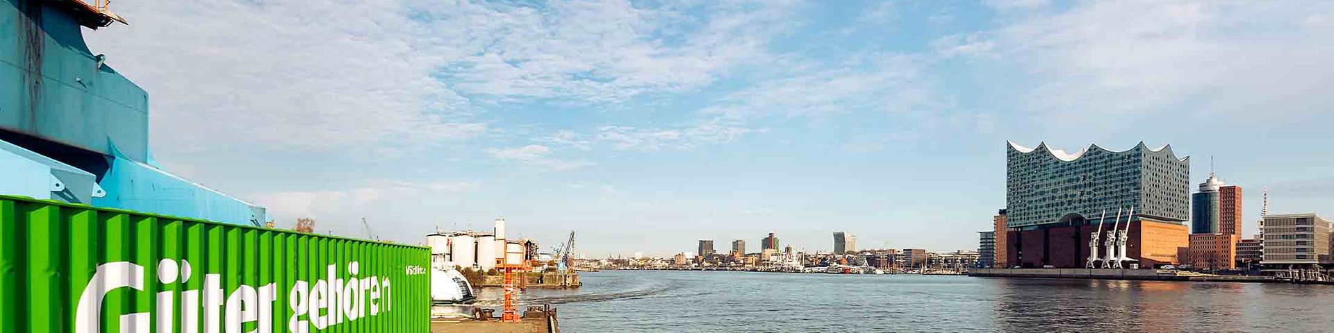 Elbphilharmonie and green DB Cargo container.