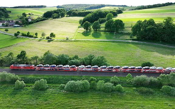 Train transporting new cars on the Automotive RailNet