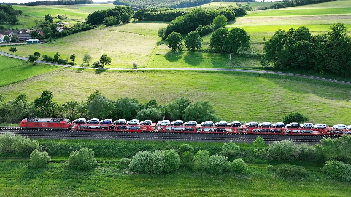 Train transporting new cars on the Automotive RailNet