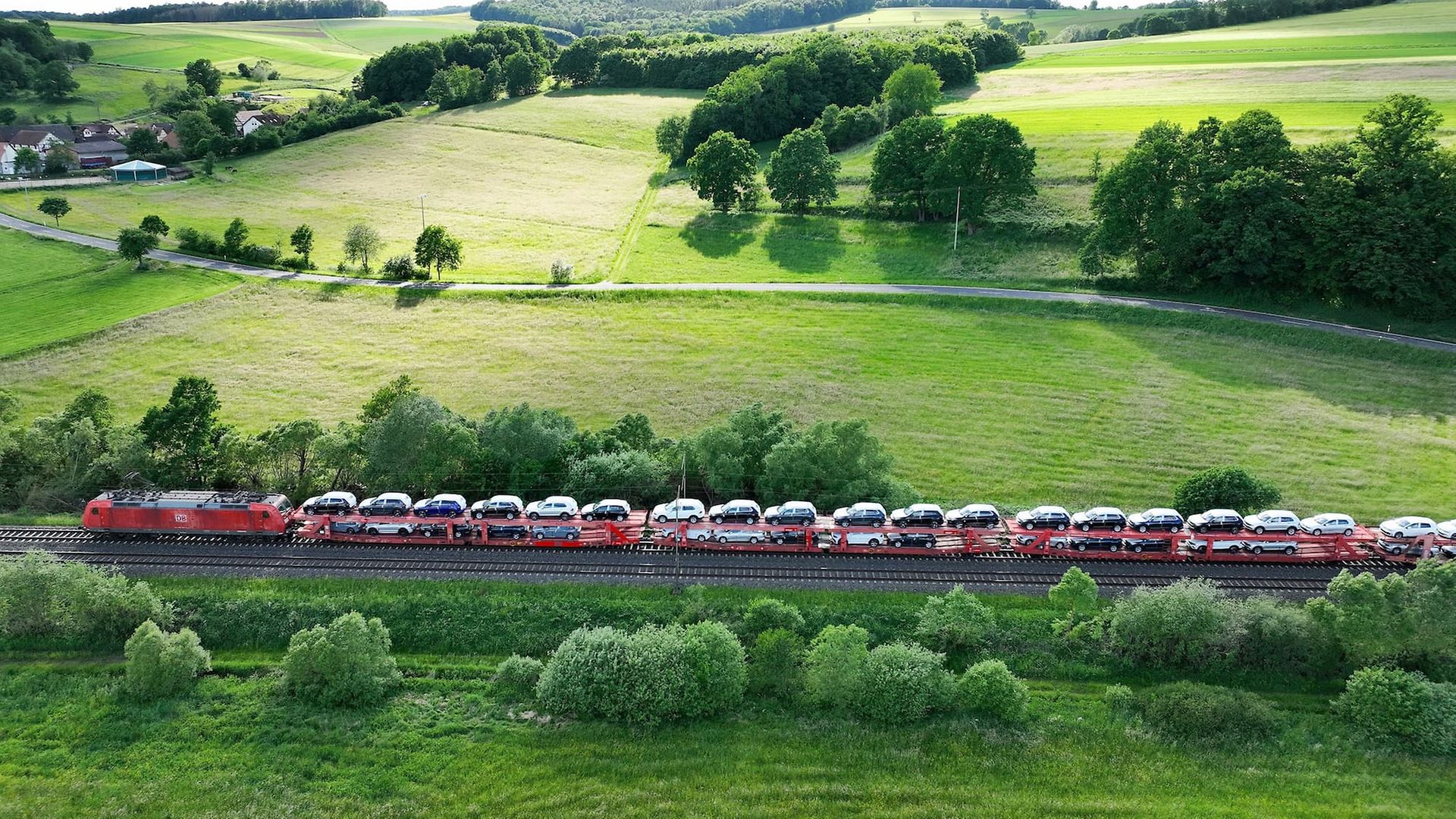 Train transporting new cars on the Automotive RailNet