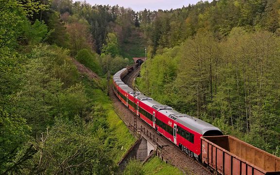 A freight train transports Talgo's new long-distance trains from Spain to Denmark.
