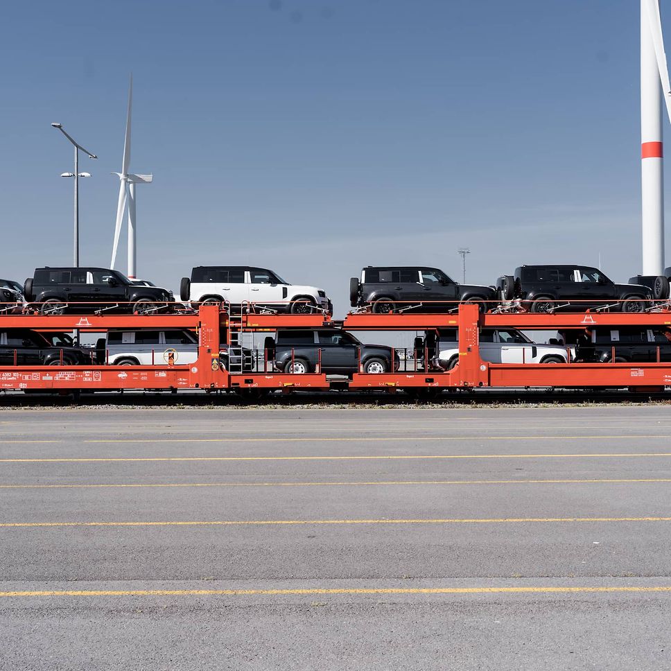 Double-decker wagons loaded with Defenders at the port of Zeebrugge