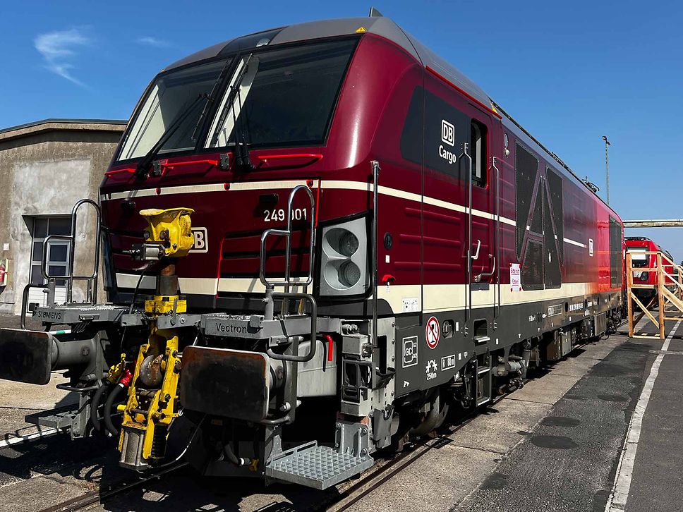 The class 249 001 locomotive in dark red stands in the Seddin marshalling yard.