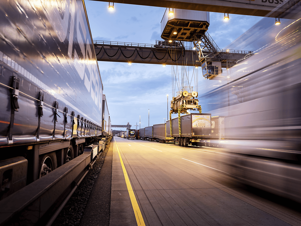 Trailer being loaded by the gantry crane in the transhipment terminal