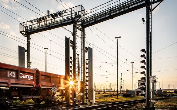 Freight wagons run under a camera gate with high-speed cameras and lighting systems