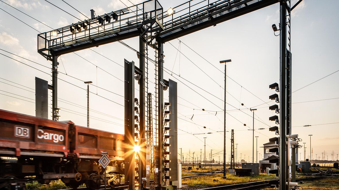 Freight wagons run under a camera gate with high-speed cameras and lighting systems