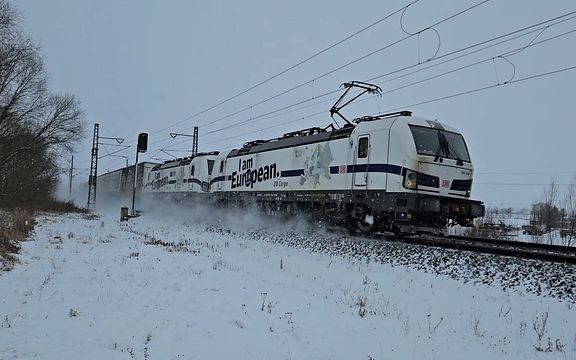 A train with an "I am European" locomotive in the Czech Republic