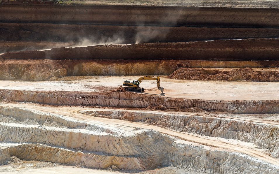 Excavator in quarry