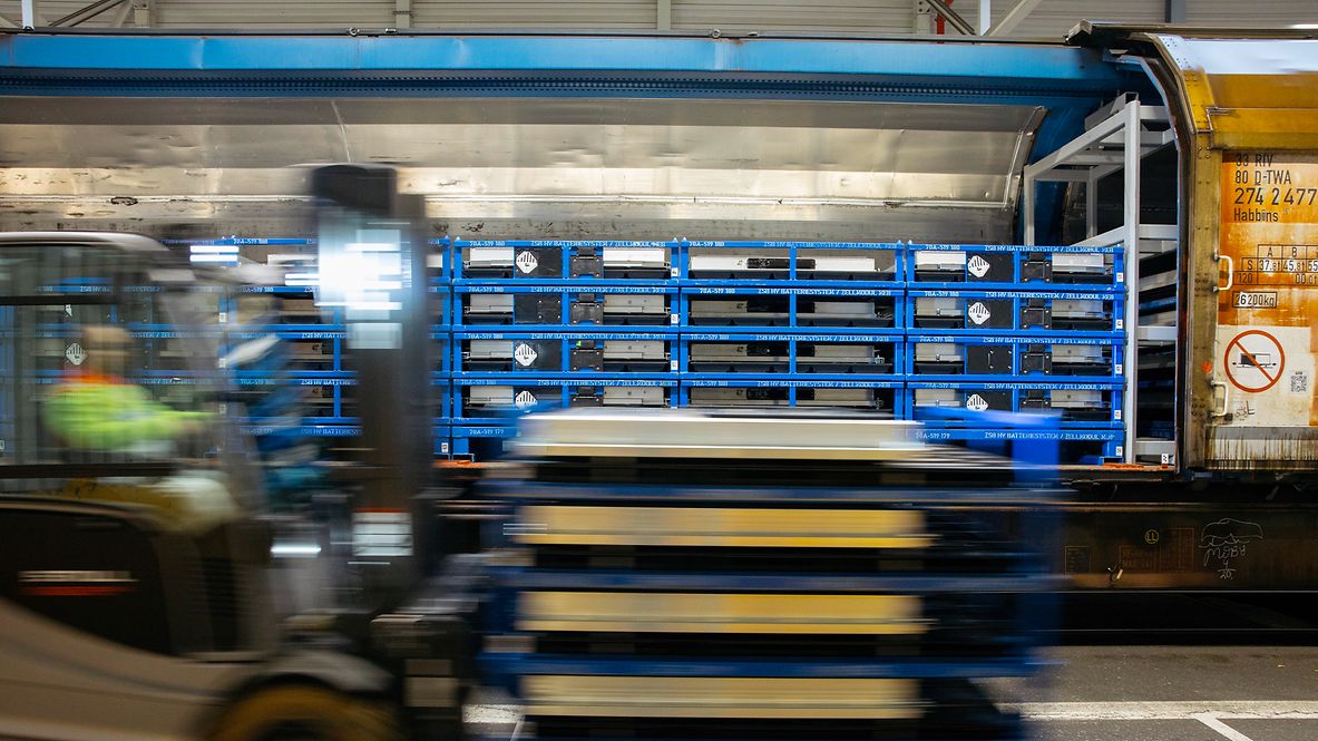  Freight wagon for transporting batteries is loaded with a forklift